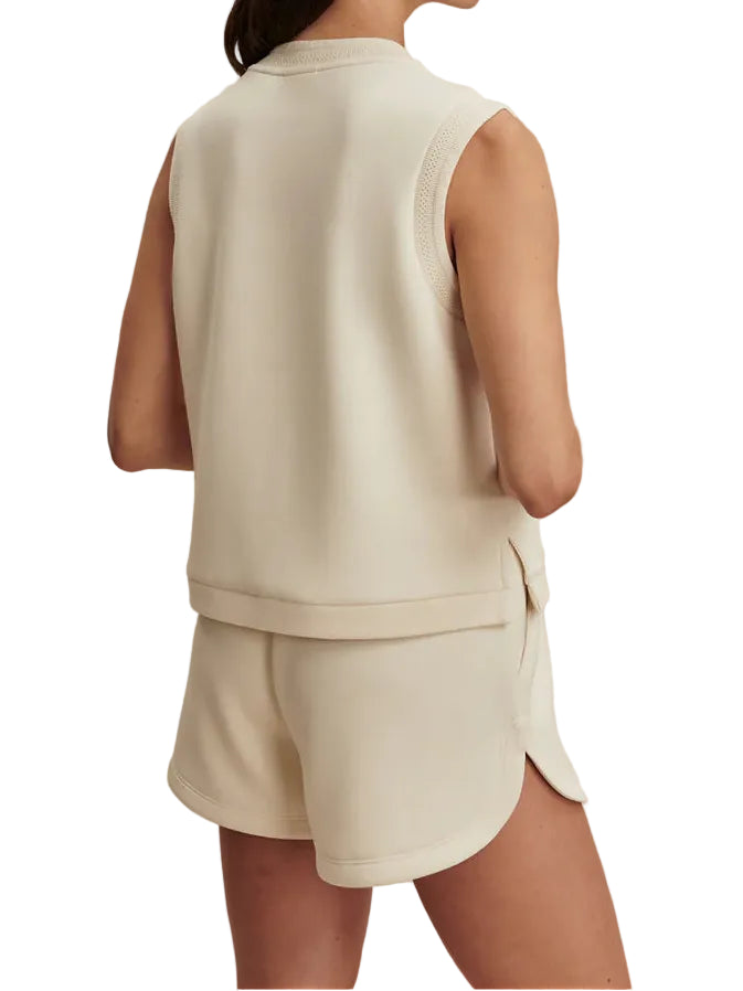 Made from our signature DoubleSoft® fabric, this cropped tank takes inspiration from our Shea tank. It features a decorative trim along the neckline and armholes, a button placket, and side splits for effortless movement and styling.