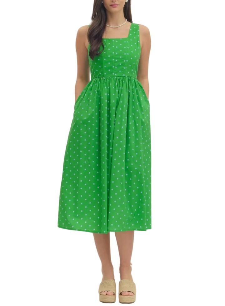 Polka dot sleeveless midi dress featuring square neckline. Back zipper closure. Smocked detail at back bodice. Pocket at side. Lined. Woven. Non-sheer. Lightweight.
