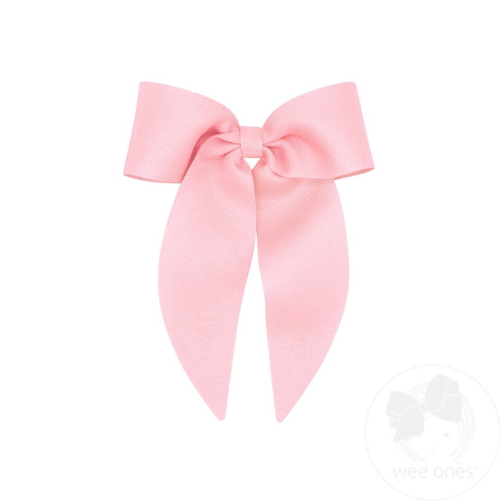 Large pink bow on a white background