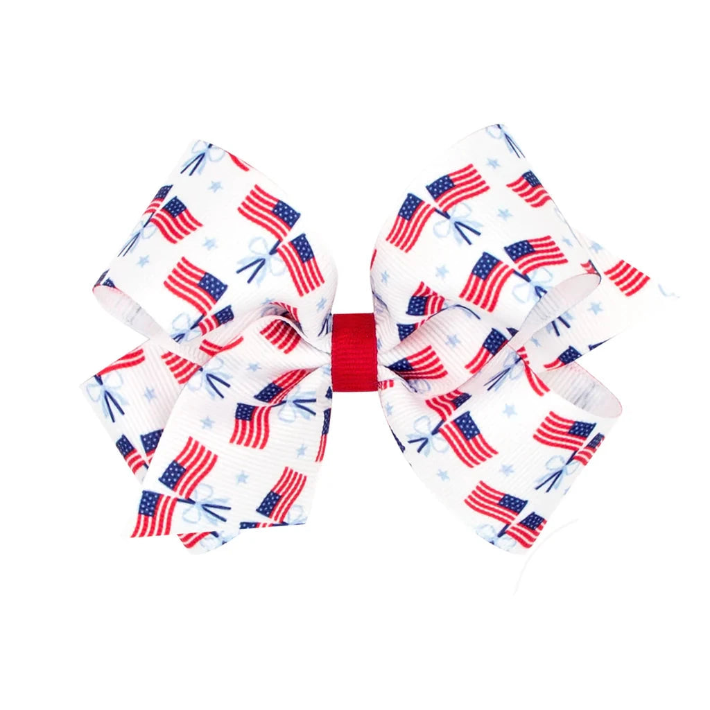 Large hair bow with American flag pattern on a white background