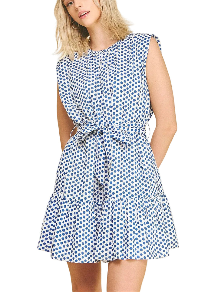 Meg Polka Dot Mini Dress brings playful charm to your everyday wardrobe. This tiered mini features a classic polka dot pattern that flatters and delights, with a flowy silhouette that moves beautifully. Perfect for casual outings, weekend brunches, or dressed up with accessories for evening plans. The tiered design adds dimension and visual interest while keeping you comfortable all day long. A versatile piece that pairs effortlessly with sneakers, sandals, or heels.