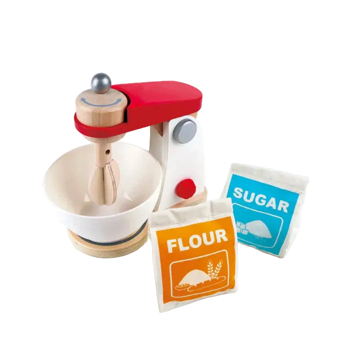 Toy mixer with a bowl, flour, and sugar packages on a white background