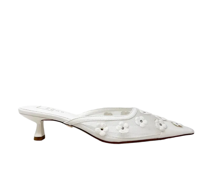 Romantic with a modern edge, NORMA is the statement mule your wardrobe has been waiting for. Designed with a sleek pointed toe and delicate floral appliqué details, this style blends feminine charm with effortless sophistication.

