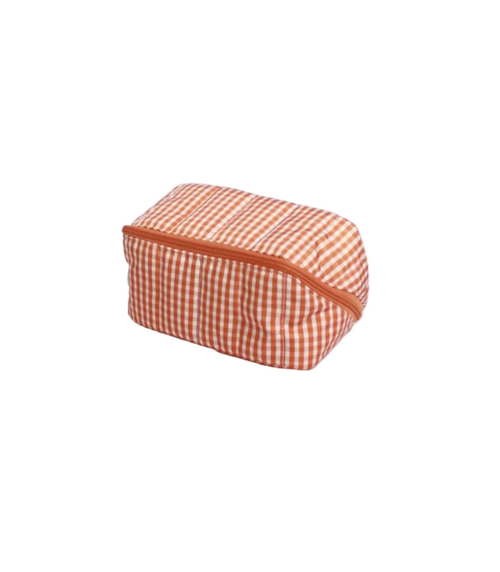 Small rectangular pouch with a orange and white checkered pattern on a light gray background