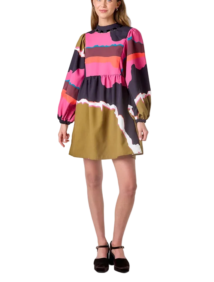 Fun and flirty, this dress is designed to turn heads. With its chic mock-neck collar, voluminous balloon sleeves, and flattering neckline details, it’s a must-have style for any occasion.