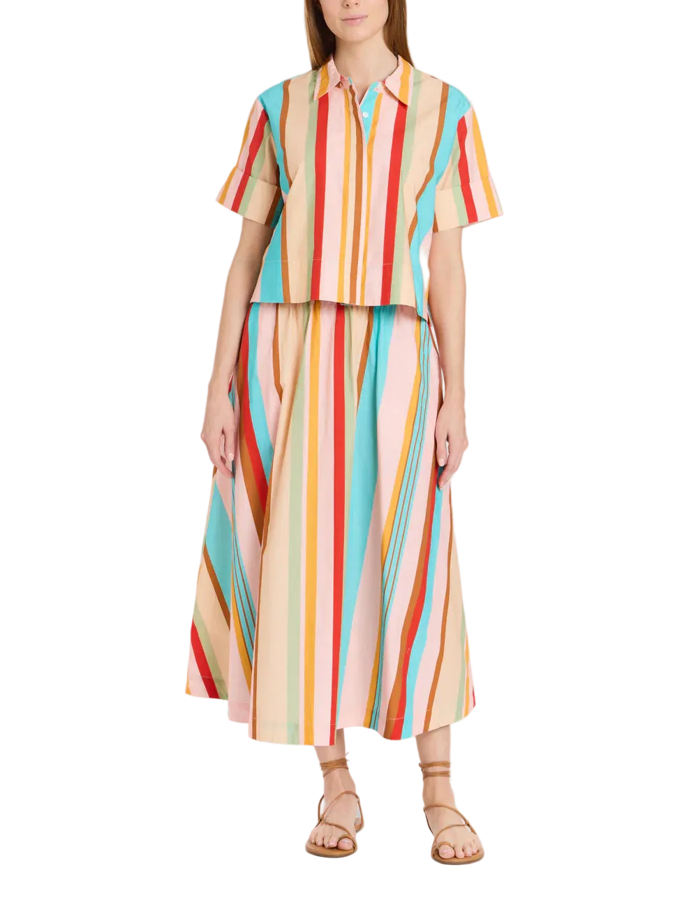 Midi length
Smocked, elastic waistband
A-line skirt
Pull-on
Pockets - of course!
Allover painterly fish print
100% cotton poplin