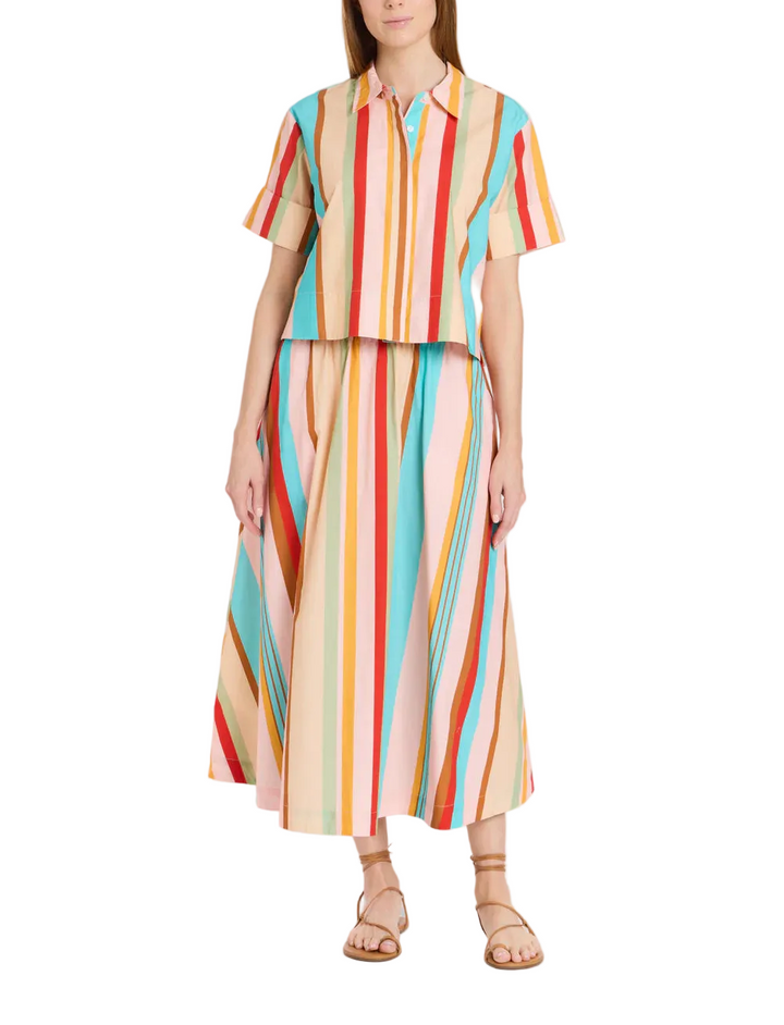 Midi length
Smocked, elastic waistband
A-line skirt
Pull-on
Pockets - of course!
Allover painterly fish print
100% cotton poplin