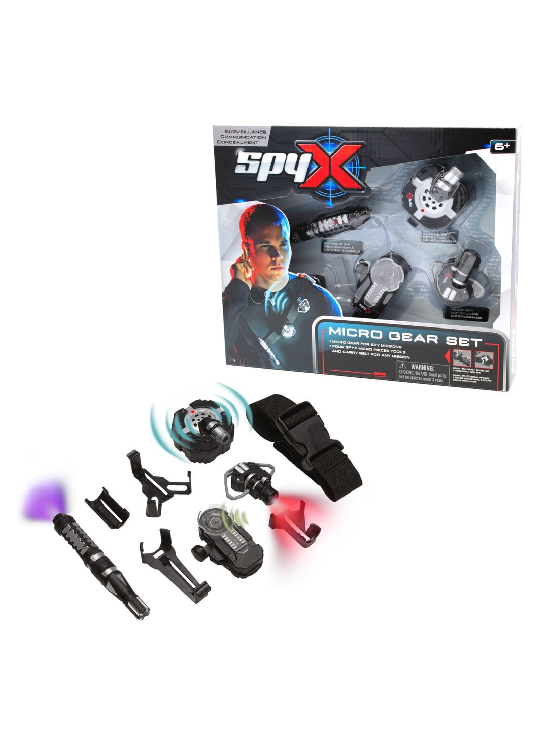 Spy X Micro Gear Set toy kit shown with its retail box on a white background. The set includes several black and gray wearable and handheld gadgets, including a wrist strap, small tools, and glowing effect pieces.