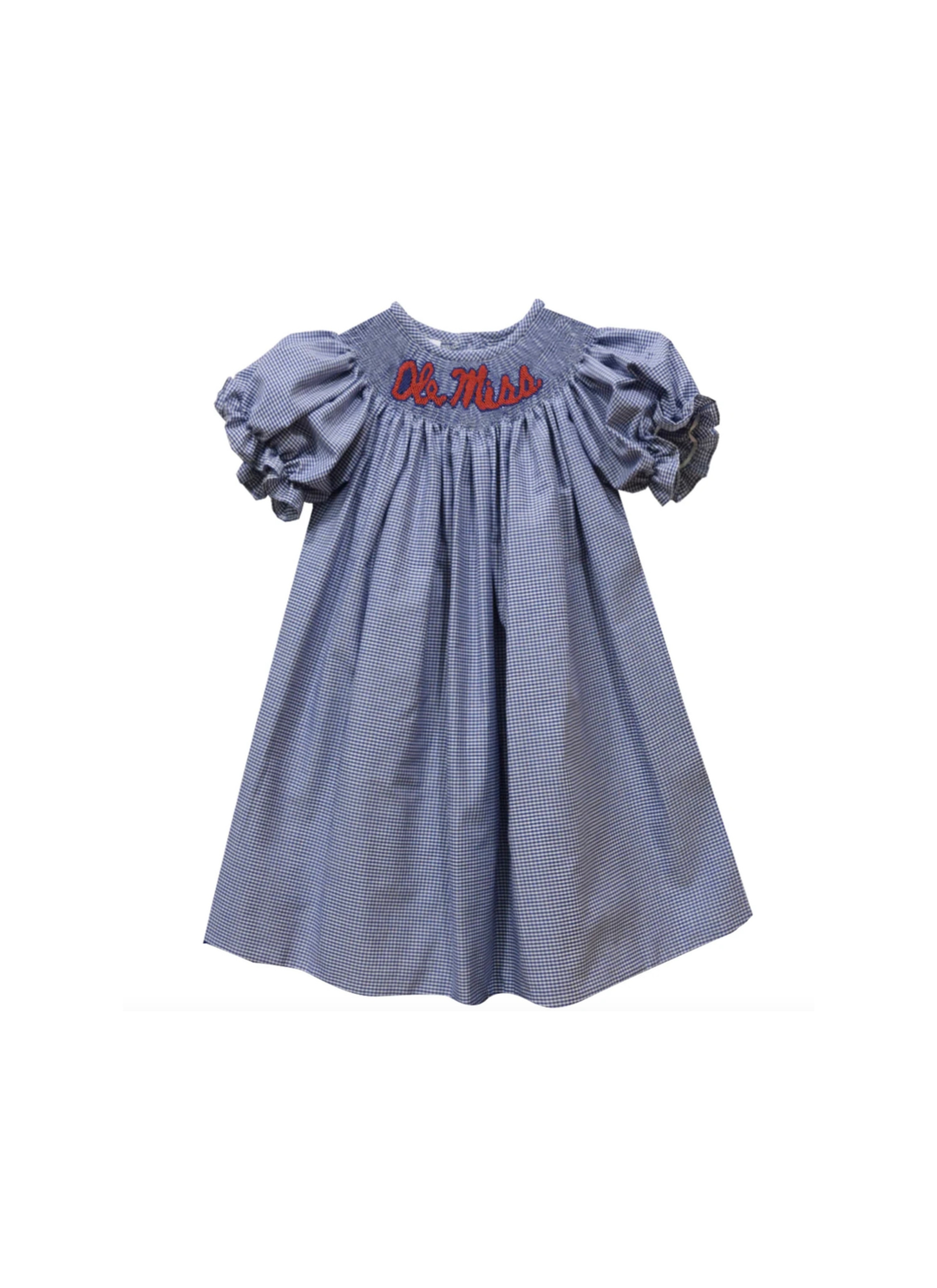 A baby girl's smocked dress in a light blue chambray fabric, featuring puffed sleeves, a smocked bodice, and red embroidered cursive text reading 'Ole Miss' on the chest.