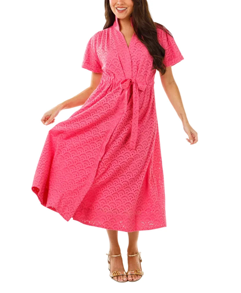 The Bria dress was designed with feminine ease in mind.  Classic style elements like a stand collar, wide self belt, covered placket and elongated cap sleeves with a pleated shoulder. This modern take on a classic dress with an empire waist will not disappoint and will be your go-to for all events!
