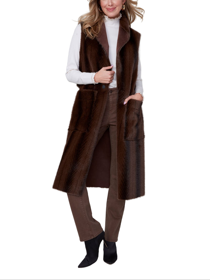 A long fur vest that will compliment your outfit.