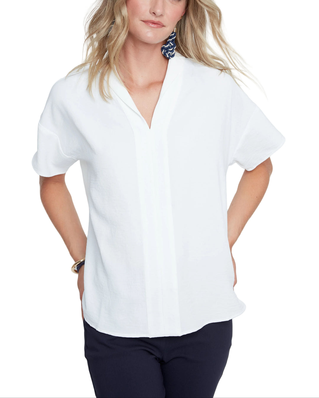 Effortless elegance meets everyday comfort in the Sheila Short Sleeve Blouse. This charming v-neck button-up features a crisp collar and short sleeves, making it the perfect go-to for layering or wearing solo. Whether you're dressing up for the office or keeping it casual, Sheila brings a touch of sophistication to any outfit. Versatile, flattering, and ready for anything your day brings.