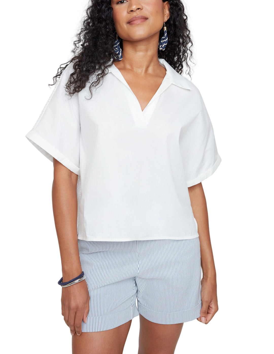 Effortlessly chic and ready for anything, the Susie Short Sleeve Top features a flattering V-neckline that's perfect for layering or wearing solo. The breathable short sleeves keep you cool and comfortable all day long, while the relaxed fit lets you move freely. Whether you're heading to brunch, the office, or a casual weekend adventure, this versatile blouse is your new go-to favorite. Simple, stylish, and oh-so-wearable.