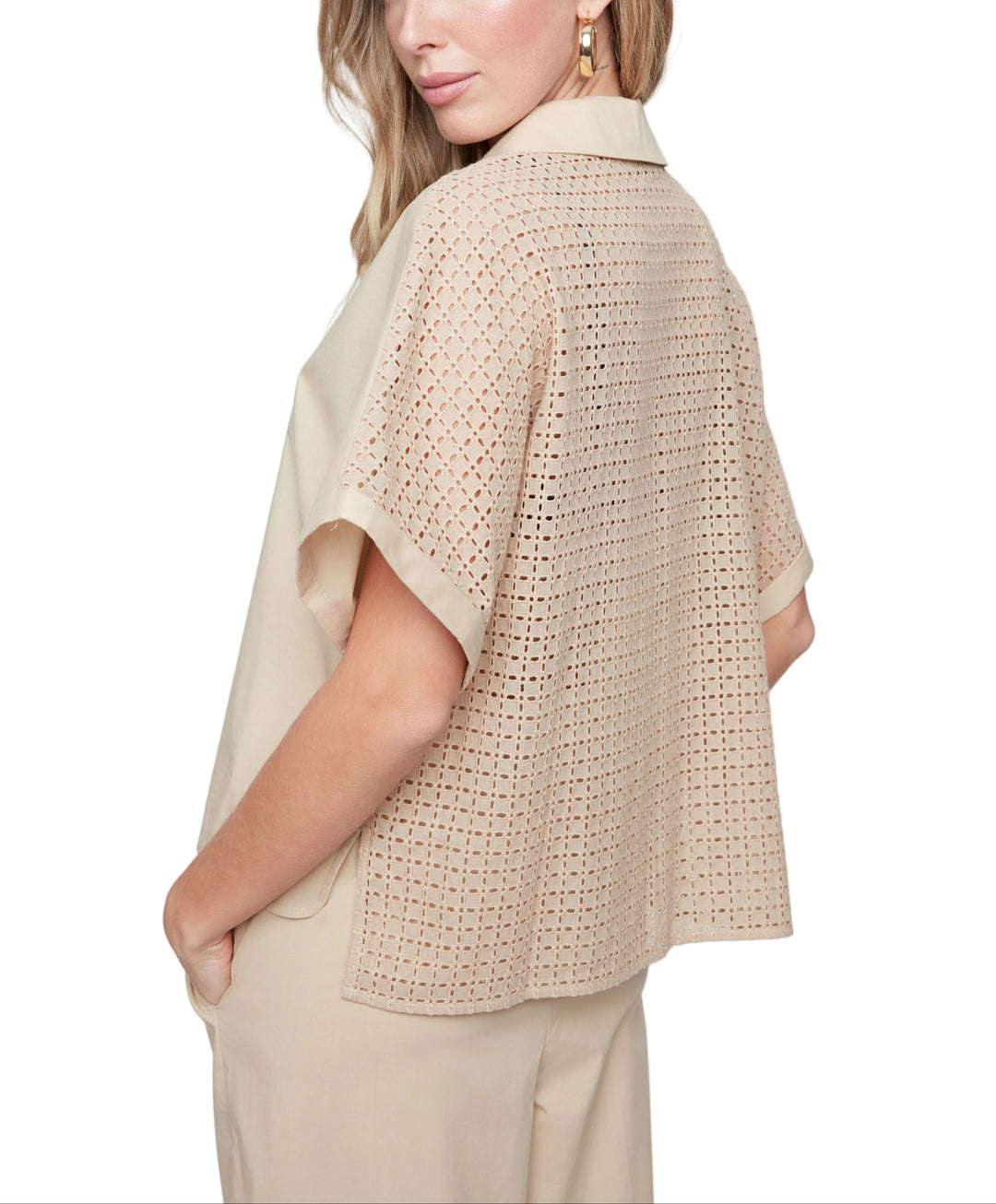 Effortlessly chic and ready for anything, the Susie Short Sleeve Top features a flattering V-neckline that&