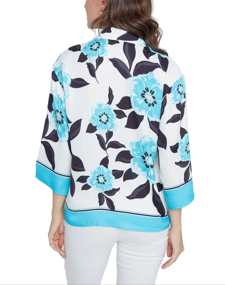 Dive into effortless style with the Kasey Blouse, a charming v-neck top that brings floral flair to your everyday rotation. The ocean combo print adds a refreshing pop of color, while the flattering 3/4 sleeves strike the perfect balance between coverage and breathability. Whether you&