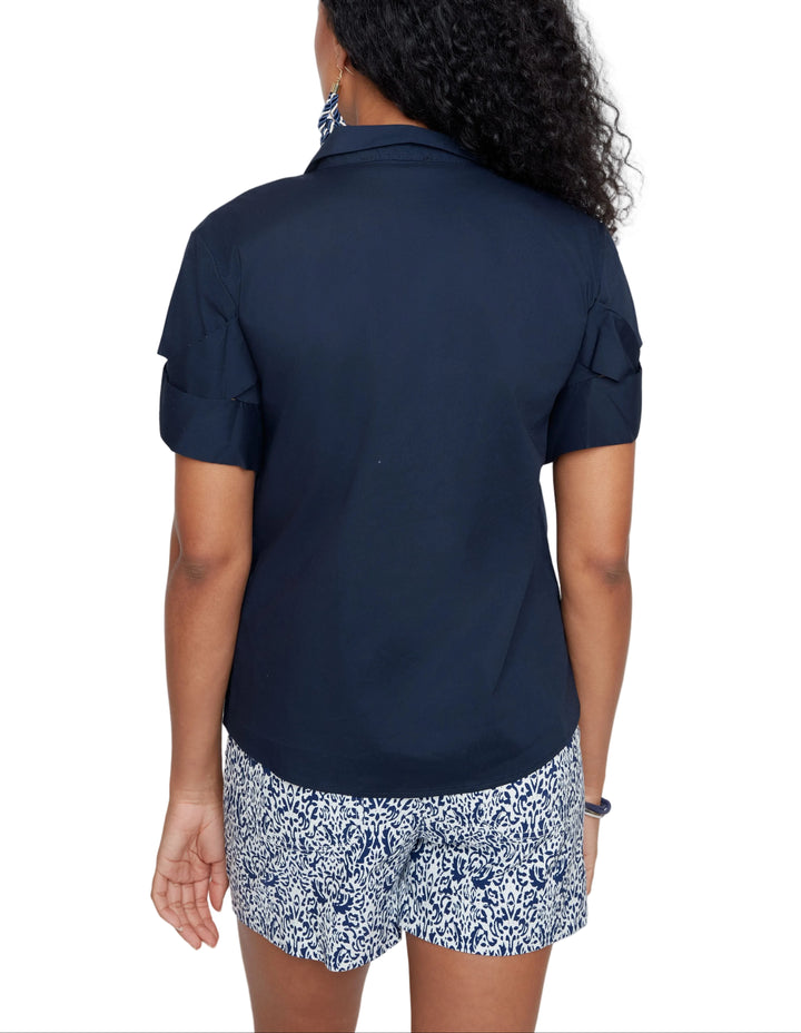 Effortless style meets everyday comfort with the Molly Short Sleeve Blouse. This versatile piece features a relaxed fit that works just as well tucked into your favorite jeans as it does layered over a tee. The breathable fabric keeps you cool through the day, while the classic silhouette ensures you'll reach for it again and again. Perfect for casual outings or dressing up with the right accessories—your new wardrobe staple awaits.