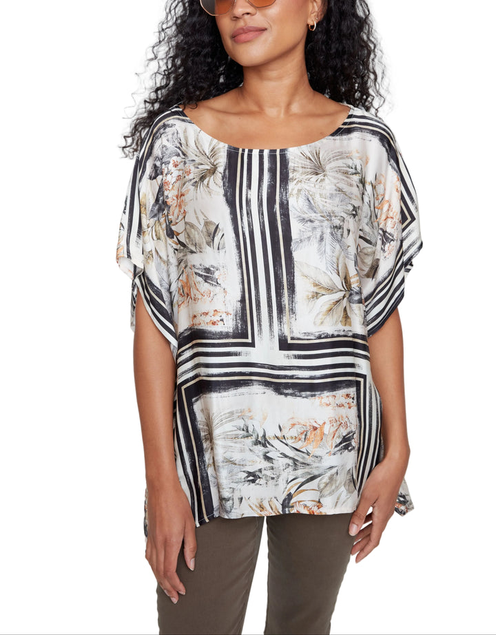 Effortless elegance meets everyday versatility with this charming short sleeve silk blouse. The classic black combo design pairs seamlessly with everything in your closet—dress it up for the office or down for weekend adventures. Crafted from luxurious silk, it drapes beautifully while keeping you cool and comfortable. Perfect for anyone who refuses to choose between style and practicality.