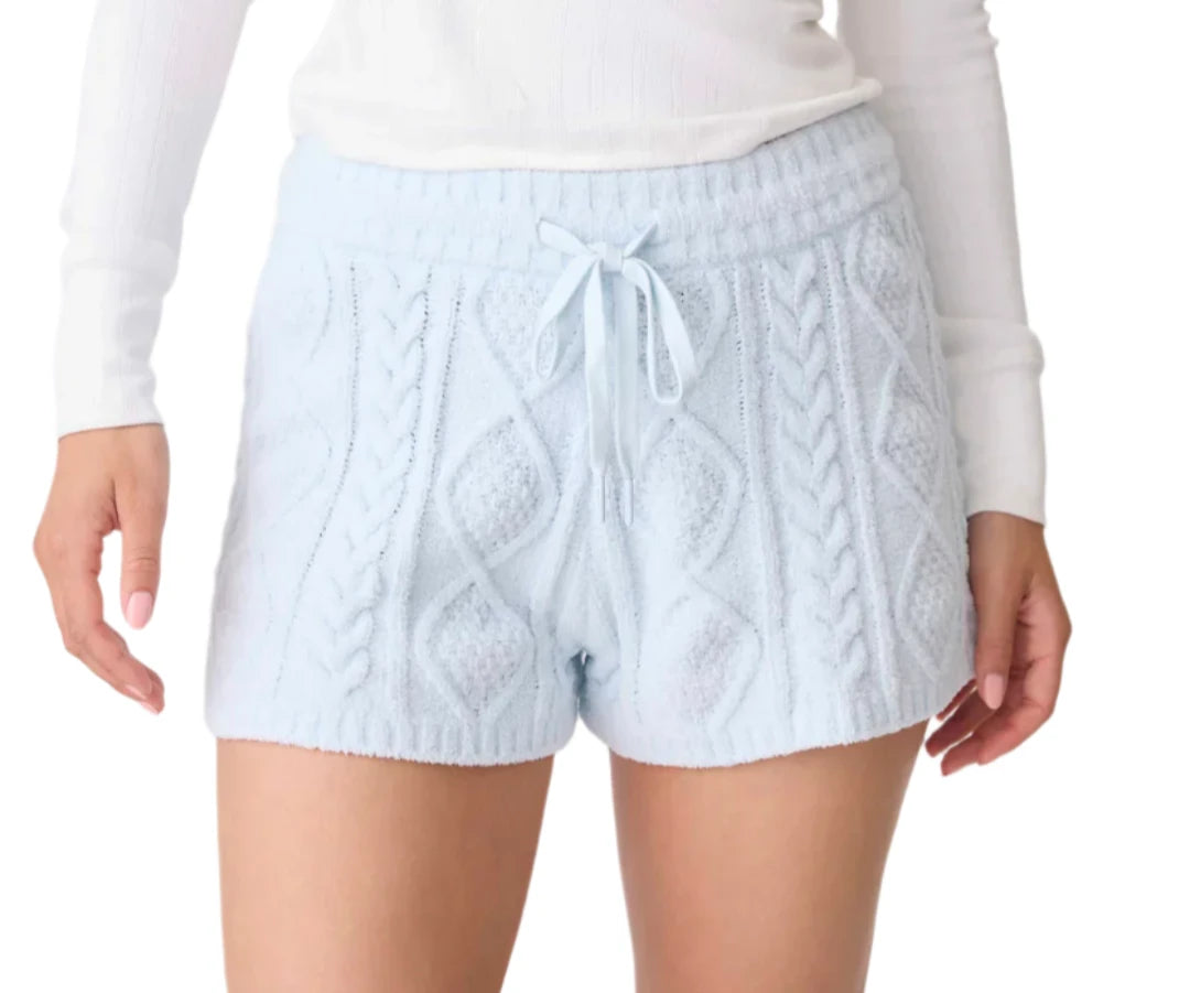 Elevate your loungewear in a chenille cozy cable short in light blue. Crafted from soft knit, this cozy piece features a charming cable texture and a stylish rib waistband with a tie for a customized fit. The serene light blue hue adds a refreshing touch, making it perfect for both relaxing at home and casual outings