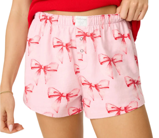 Embrace feminine charm with these pink boxer style PJ shorts, adorned with an adorable pink bow pattern. The playful bow design adds a touch of femininity, while the breathable material keeps you cool and comfortable. With an elastic waistband for easy wear, these shorts are an essential addition to your loungewear collection. Pair them with your favorite tee or pajama top for a cute and cozy ensemble that’s perfect for any relaxed day!

DETAILS
Women's pink boxer-style PJ shorts
Pink bow pattern