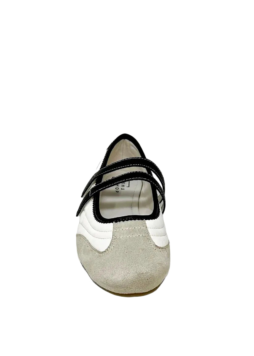 Sweet, retro, and completely wearable. SALOME in Bone is your go-to for a polished yet playful look. This dual-strap Mary Jane flat combines off-white, black, and neutral suede tones for a graphic, editorial twist on a timeless silhouette. Whether you're pairing it with denim or dresses, SALOME makes every step feel styled. Perfect for day-to-night outfits and loved for its secure fit and comfort-forward design.