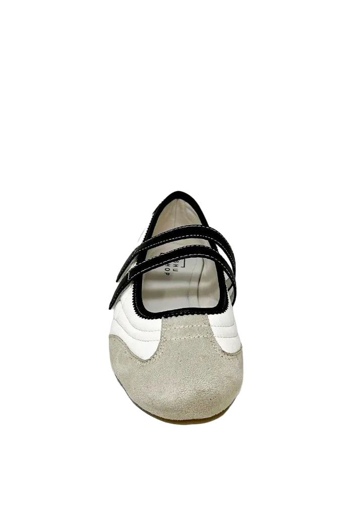 Sweet, retro, and completely wearable. SALOME in Bone is your go-to for a polished yet playful look. This dual-strap Mary Jane flat combines off-white, black, and neutral suede tones for a graphic, editorial twist on a timeless silhouette. Whether you&