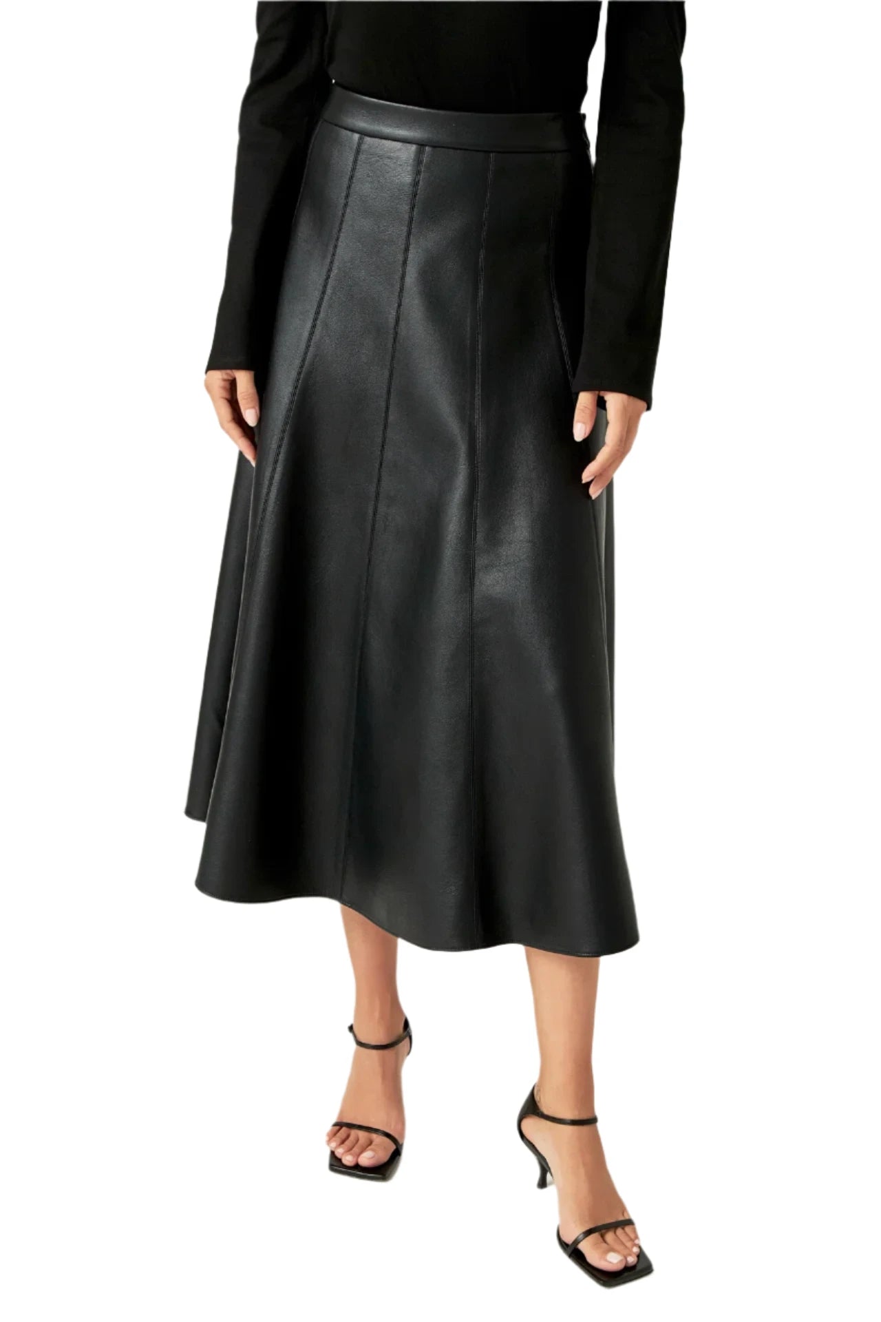 Give your wardrobe a stylish and sophisticated spin with our Flare Faux Leather Midi Skirt. This ultra-flattering skirt features a flared silhouette that adds volume and movement to your look. Crafted from high-quality faux leather material this skirt is a must-have for any fashion-forward woman. Elevate your outfit game and turn heads with this versatile and on-trend skirt.