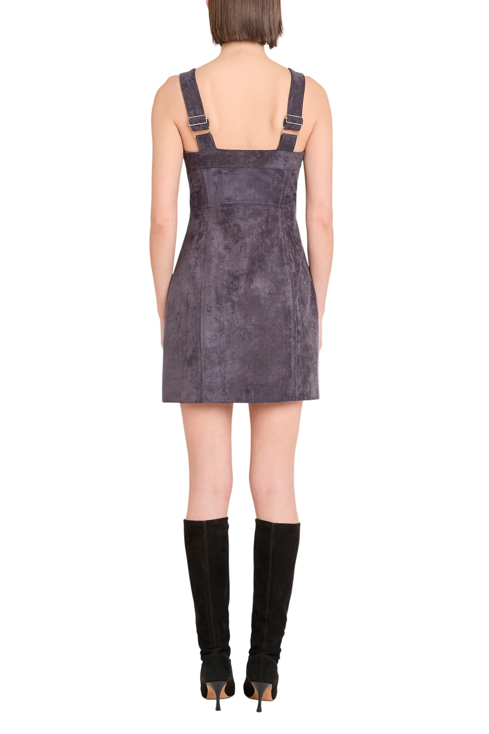 Show up strong in the Becker Dress. Crafted from suede with wide straps and a zipper all the way up the front, it’s got structure with a hint of attitude. Pair with black boots and layer on the Becker Jacket to complete the set.