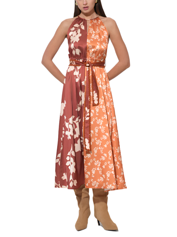Turn heads in the Sandi Two Toned Halter Midi Dress, featuring a vibrant marigold and rich brown color combo. Its flattering halter neckline and midi length create a playful yet elegant silhouette perfect for sunny days or evening fun.