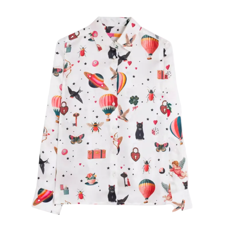 A white long-sleeve button-up shirt with an all-over whimsical print of hot air balloons, hearts, butterflies, stars, and small illustrated motifs, shown flat against a light gray background.