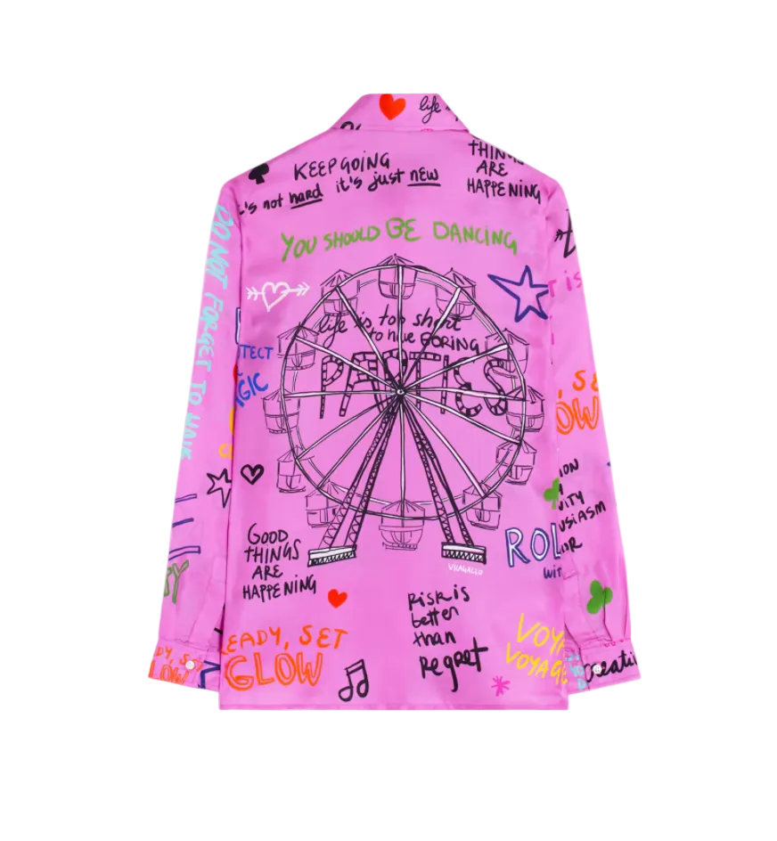A bright pink long-sleeve shirt jacket featuring a large black line art illustration of a Ferris wheel on the front, surrounded by colorful graffiti-style text and doodles in green, yellow, orange, and red, shown against a plain white background.