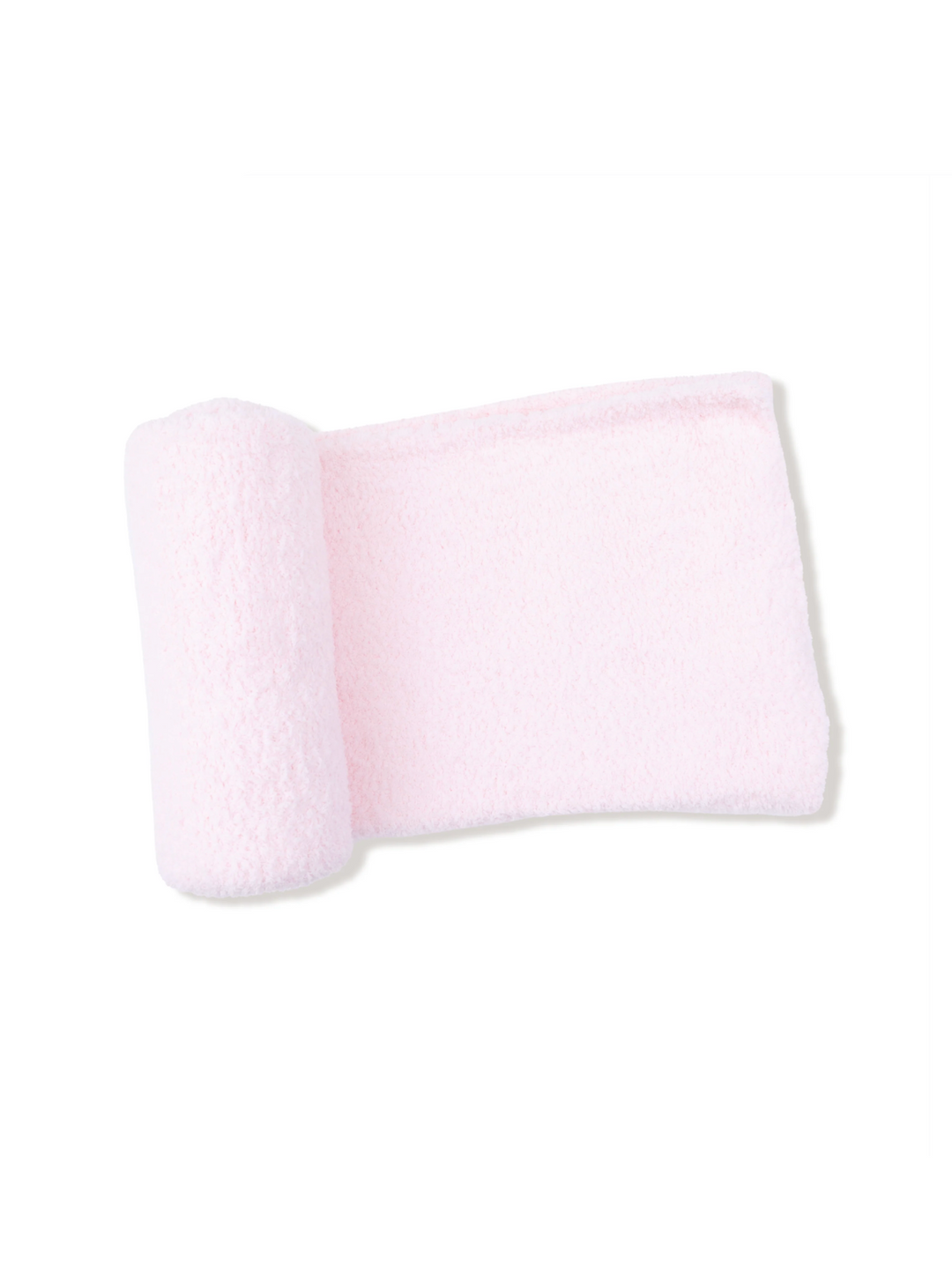 A light pink plush bath towel with a rolled corner, displayed on a clean white background with a faint drop shadow.