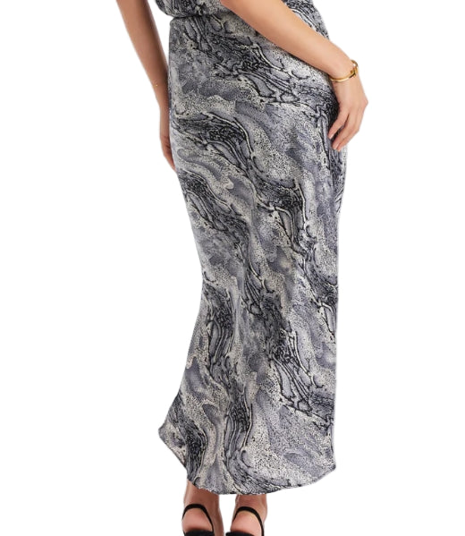 Equal parts effortless and elegant, the Bias Cut Slip Skirt boasts a sleek, streamlined silhouette with a high waist and front slit for ease.
