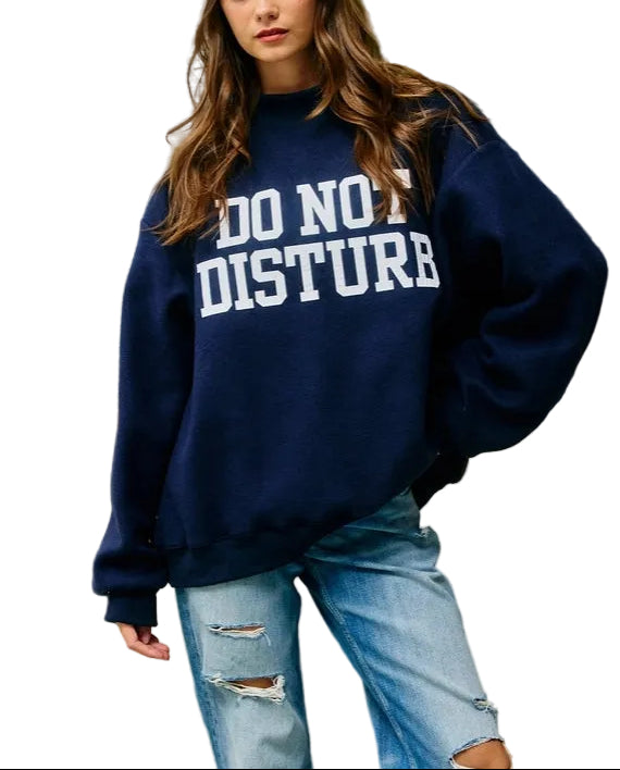 Reversible "HOMEBODY" Mock Neck Sweatshirt
- Introducing a fully reversible design that effortlessly transforms from a definitive statement piece with a bold "HOMEBODY" graphic to a modern, minimalist form with a sharp "DO NOT DISTURB" slogan on the other side, offering exceptional two-in-one versatility.