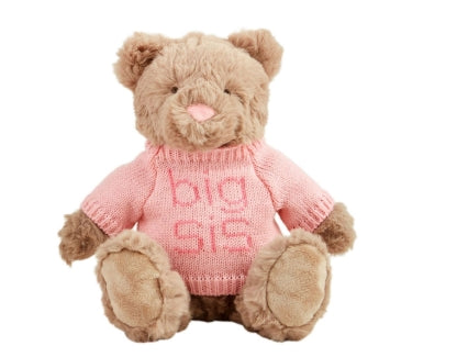 Faux fur plush bear with knit sweater and weighted seat.