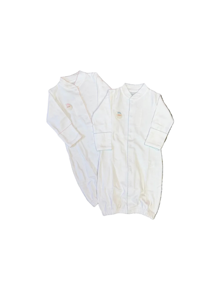 two white converter gowns with santa motif