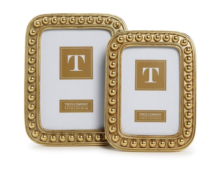 Crafted with a timeless gold ball frame design, these frames exude elegance and refinement, adding a touch of sophistication to any roomConstructed with high-quality resin, these frames are built to last, preserving your precious memories for years to come while adding a touch of luxury to your dècorWhether for a housewarming, wedding, or any special occasion, this set makes a thoughtful and stylish gift for friends and loved onesStands or hangs horizontally or vertically