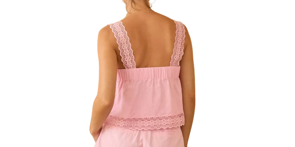 Effortlessly chic and oh-so-charming, this sleeveless top features a flattering square neckline and delicate lace trim that adds a touch of romance to your everyday look. The soft strawberry milk hue is perfect for layering or wearing solo, making it a versatile wardrobe essential that transitions seamlessly from casual days to special occasions. Slip it on and feel the confidence boost!