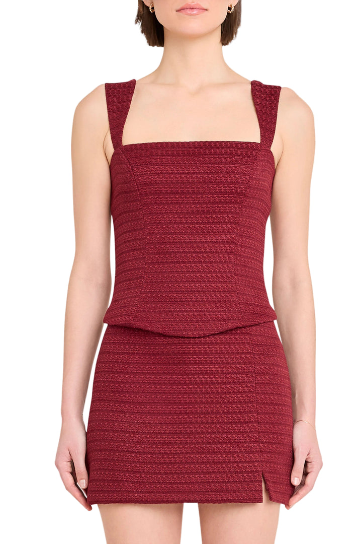 Stay sharp in the Ceronne Top. This corset-style tank features flattering princess seams, making it your go-to for cool, refined looks. Match it with the Dale Skort for a set you’ll wear on repeat.