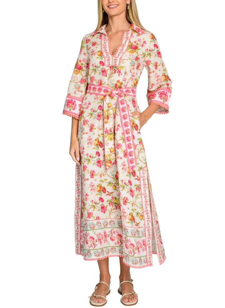 Talia, the chic older sister of our beloved Taylor dress, has been updated this season with side slits, decorative trim, and a sash belt. Perfect to take on vacation, Talia is fab in our English Gardens print and can easily be dressed up or down.

Product Details

Viscose linen
A-line tunic silhouette
Collared V-neckline
Bell sleeves
Optional sash belt
Side seam pockets
Side slits
Fully lined
Decorative &amp;amp; crochet trim accents