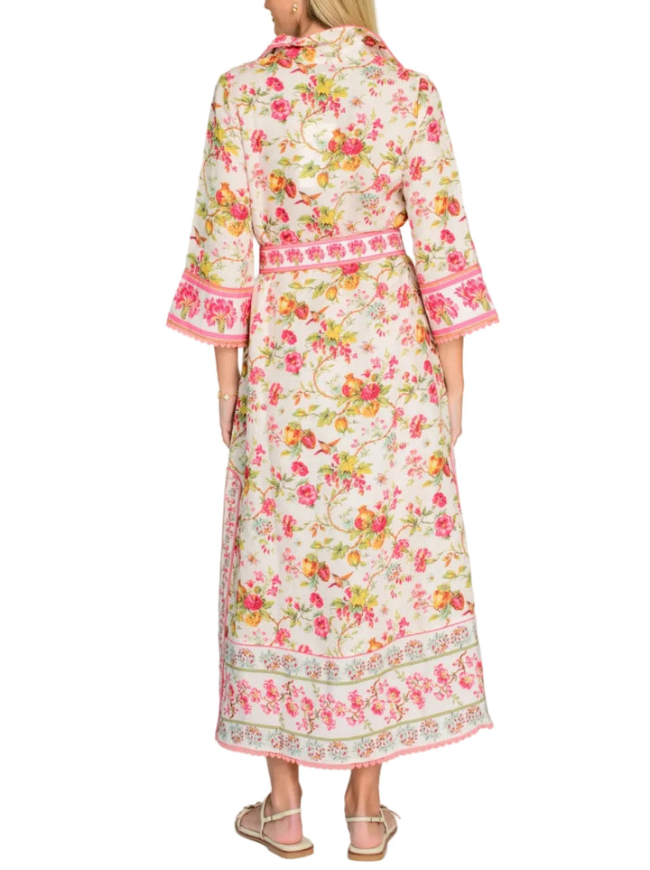 Talia, the chic older sister of our beloved Taylor dress, has been updated this season with side slits, decorative trim, and a sash belt. Perfect to take on vacation, Talia is fab in our English Gardens print and can easily be dressed up or down.

Product Details

Viscose linen
A-line tunic silhouette
Collared V-neckline
Bell sleeves
Optional sash belt
Side seam pockets
Side slits
Fully lined
Decorative &amp;amp; crochet trim accents