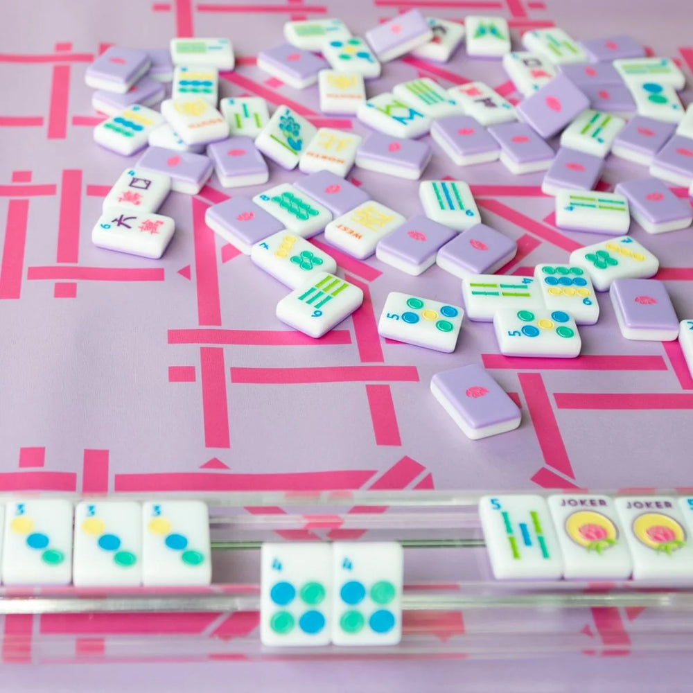 Material:
Acrylic

Dimensions:
Each tile is 1" x 1 & 7/16" x 7/16"

Weight:
Approx. 5 lbs total

INCLUDED:
1 set of 160 mahjong tiles (36 dots, 36 bams, 36 craks, 8 flowers, 16 winds, 4 white dragons/soaps, 4 green dragons, 4 red dragons, 10 jokers, 6 blanks)
1 tile guide
1 player’s guide to mahjong