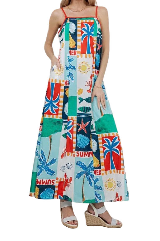 Woman wearing a colorful patterned dress in a room with plants and furniture.