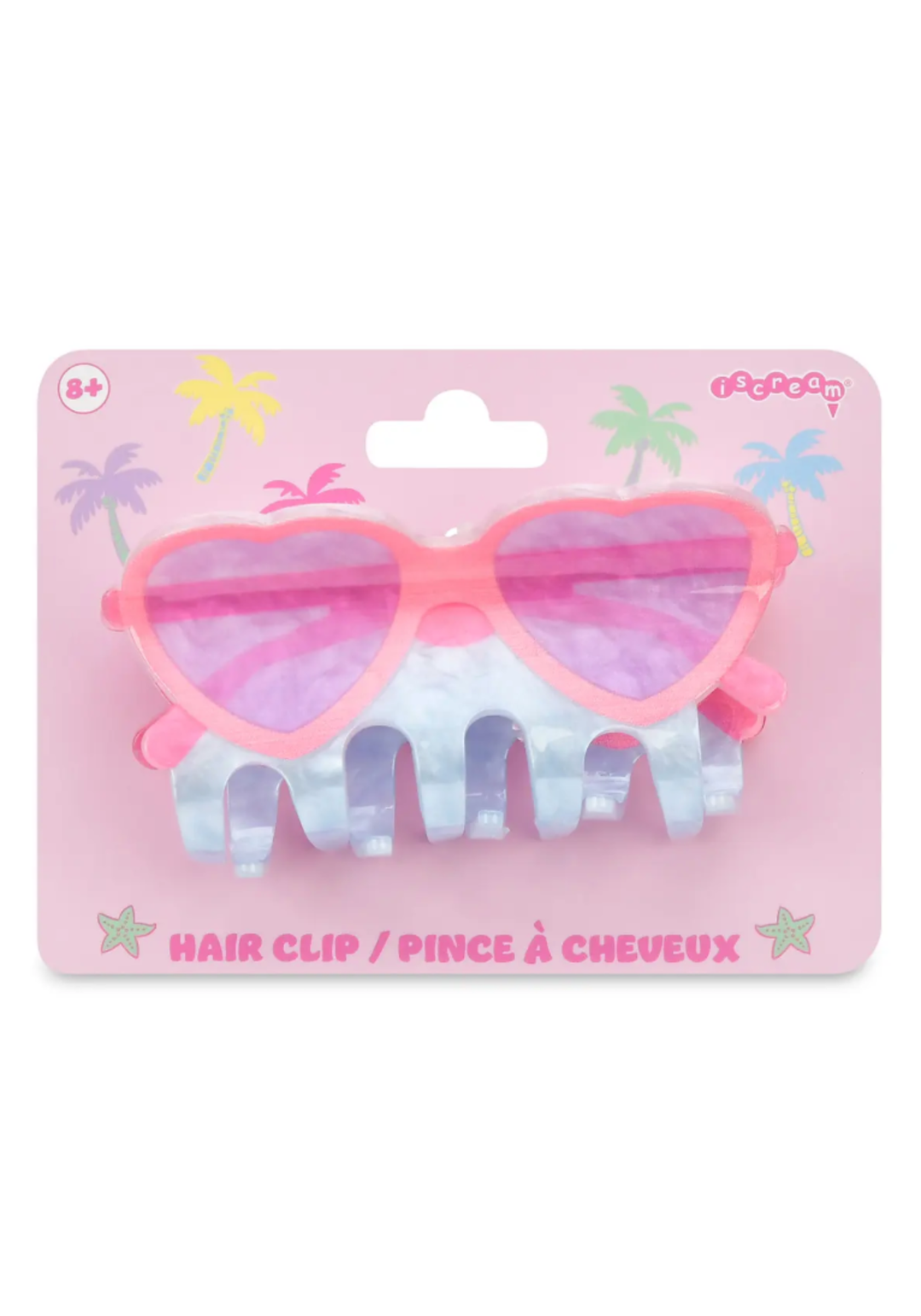 Heart-shaped hair clip with pink and purple design on a pink packaging background
