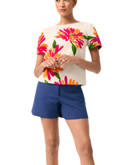 This charming floral embroidered top is made of lightweight cotton voile and finished with moss stitch embellishment. The classic crewneck, short-sleeved style makes this top an effortless silhouette for all your summer activities.

Crewneck
Short Sleeve
Pull On
Moss Stitch Embellishment
Unlined
Runs True To Size