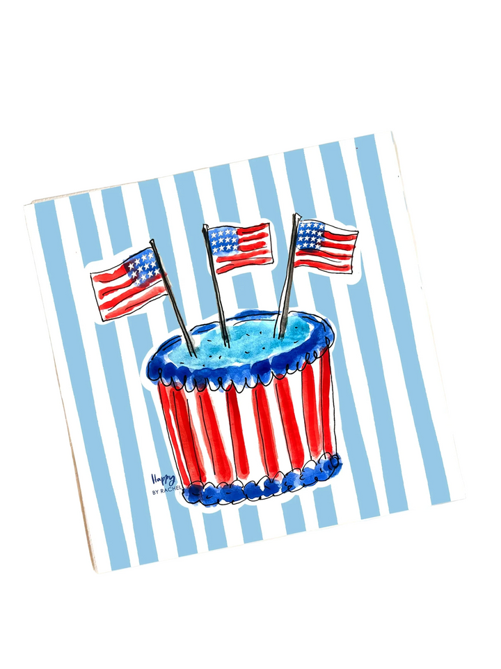 Napkins with a patriotic design featuring a cupcake and American flags on a blue and white striped background.