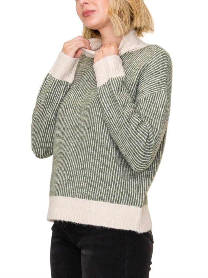 Stay cozy and chic with the Jessica 2 Tone Ribbed Turtleneck Sweater! Its playful blend of two tones adds a fun twist to your fall wardrobe, while the ribbed texture ensures a flattering fit that keeps you warm. Perfect for layering or wearing solo, this sweater brings a splash of style to any casual outing.