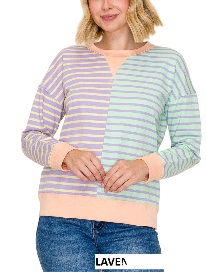 Stay cozy and stylish in the Demelaz color trimmed stripe sweatshirt. With vibrant stripes adding a fun pop of color, this playful sweatshirt brings a fresh twist to your casual wardrobe. Perfect for layering or lounging, its comfortable fit keeps you warm while showcasing your bold, cheerful side. Embrace effortless cool and brighten your day with this lively essential.
