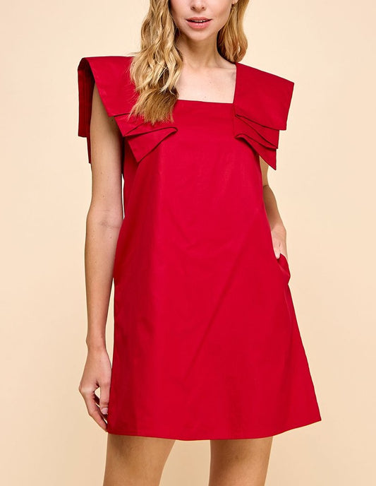 A pleated sleeveless short dress, with a loose fit. Hidden zipper at rear and hidden side pockets.
