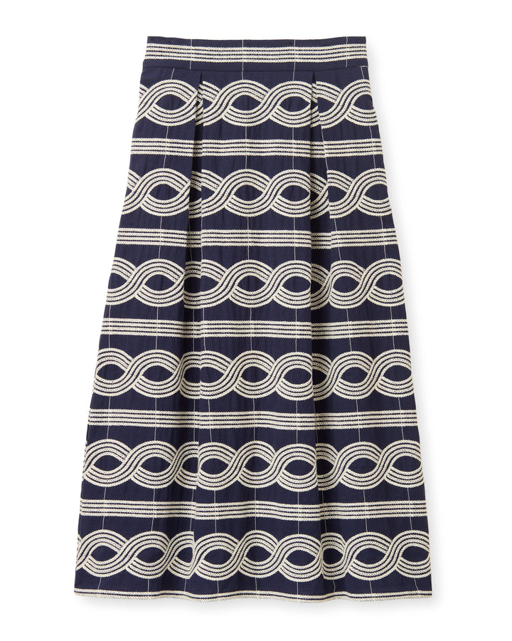 Bringing a sculptural, textured edge to a classic silhouette, this versatile anchor moves with a quiet grace. It beautifully mirrors the deep waters it draws inspiration from.

Elegant midi-length silhouette crafted from a beautifully embroidered specialty linen blend

Designed with a sleek front and hidden elastic placed in the back waist for an incredibly comfortable fit

Fully lined in breathable cotton voile, featuring a hidden side zipper and highly functional side pockets