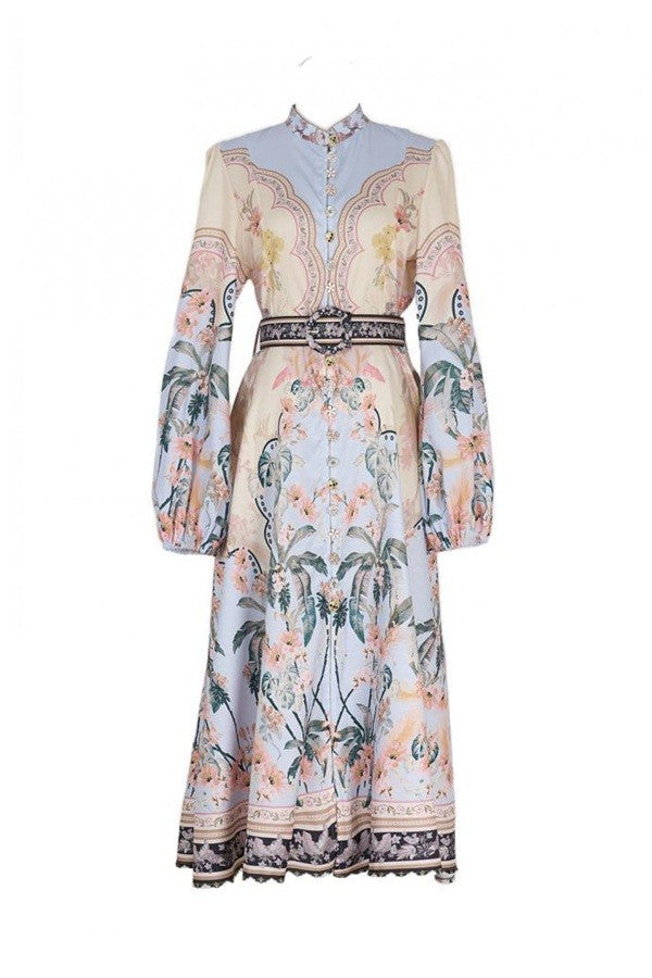 Step into sunshine with the Maddie Midi Dress in Apricot/Blue! This playful long-sleeve dress features a high collar and charming printed fabric that adds a splash of color to your day.
